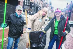 Jane Fine, Ellen Rooney, and NABB President Sue Baker take on the debris in Alley 419.
