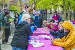 Back Bay neighbors register with NABB volunteers at the Clarendon Street Playground for cleanup assignments.