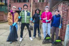 Phi Kappa Sigma brothers contribute to the cleanup.