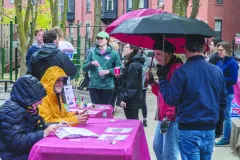 Back Bay neighbors register with NABB volunteers at the Clarendon Street Playground for cleanup assignments.