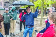 NABB Chair Serge Savard is not deterred by the precipitation in leading his neighbors in cleaning up the streets and alleys of Back Bay.